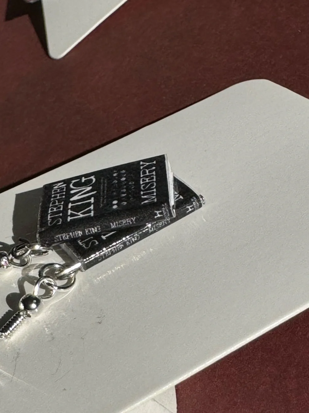Stephen King 'Misery' Book Cover Dangle Earrings - Black & Silver - Picture 4 of 6